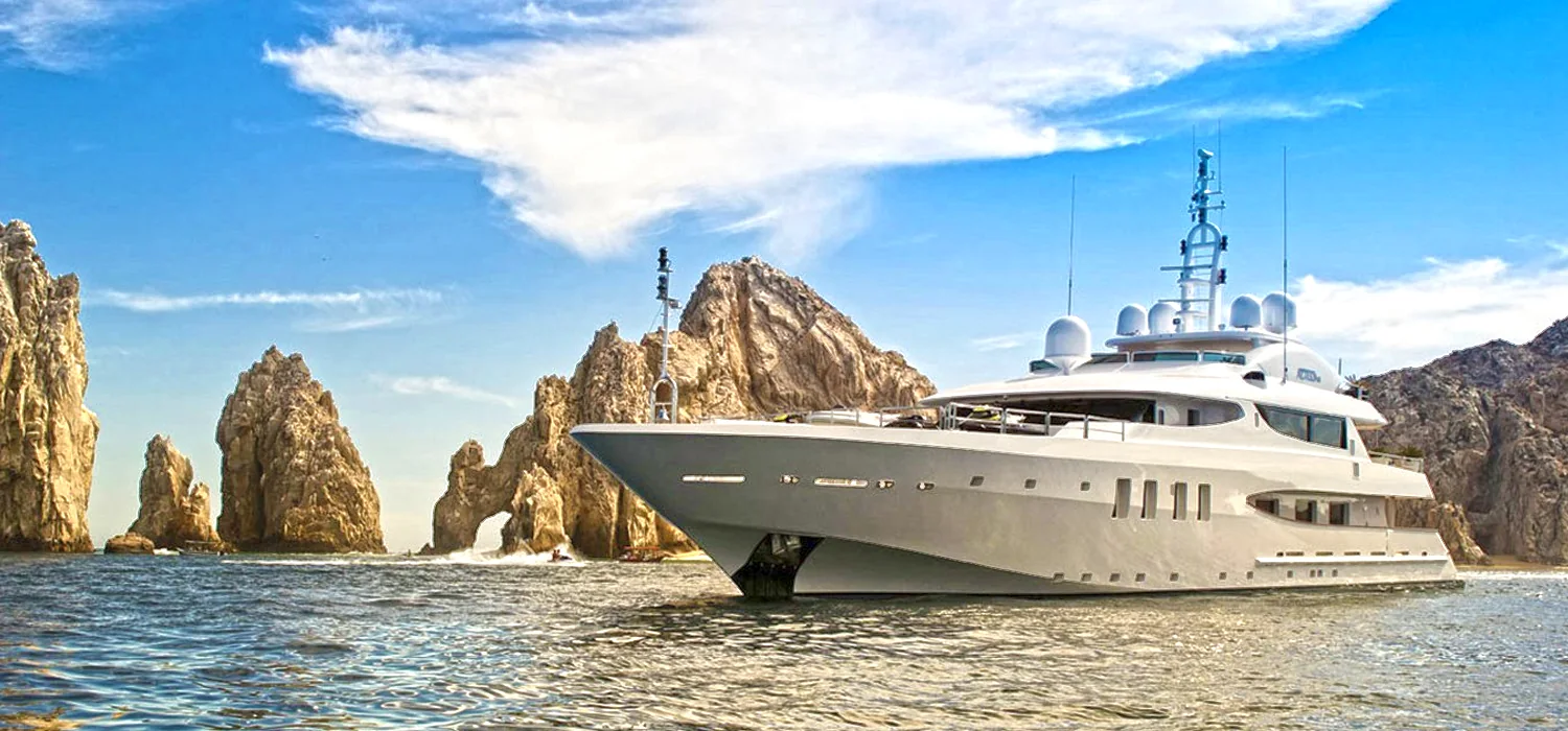 Yacht beside the rock formations at Land's End