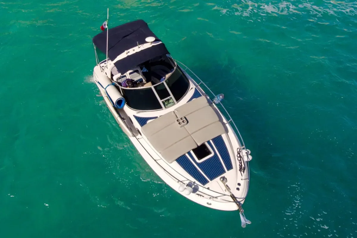 Aerial view of the 32' Sea Ray over green water