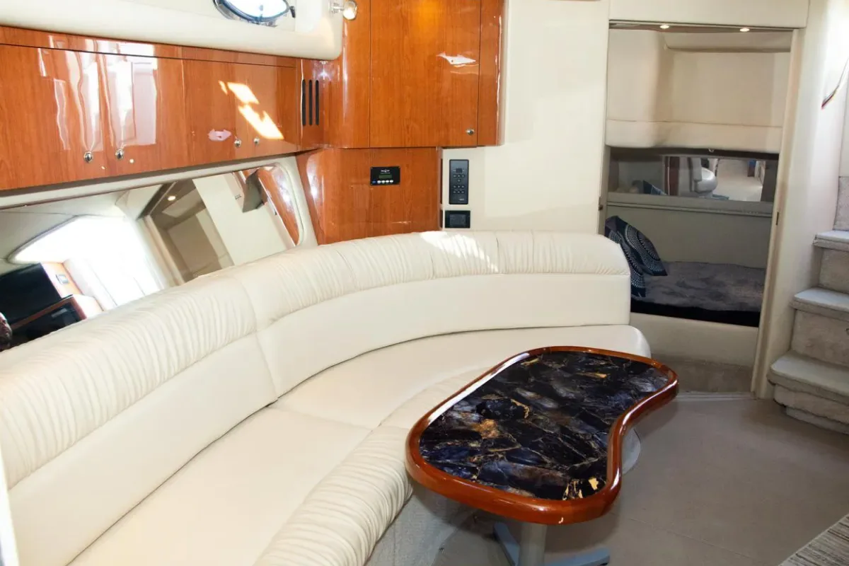 Cabin salon with curved leather seating