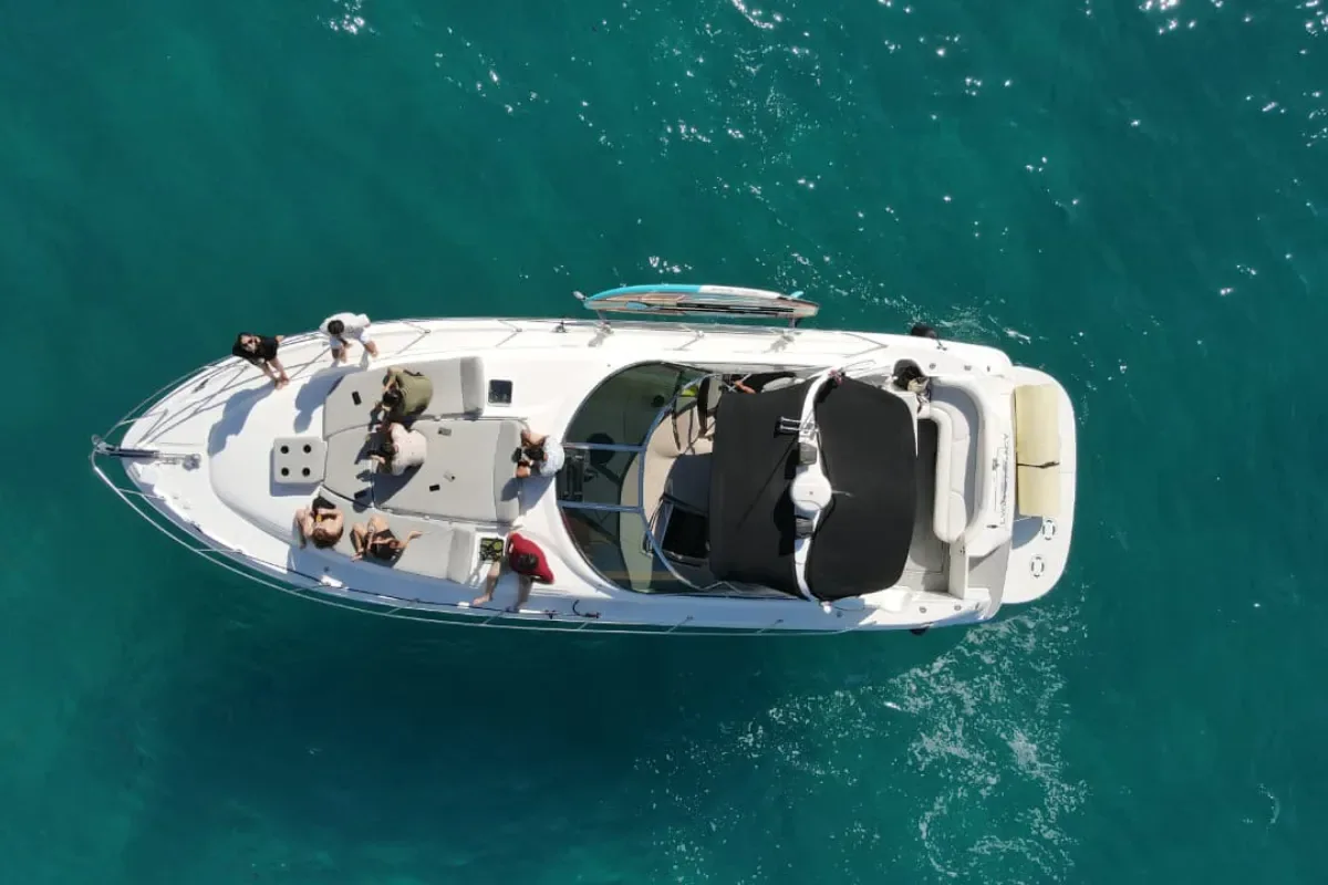 Overhead view of the Sundancer on turquoise water