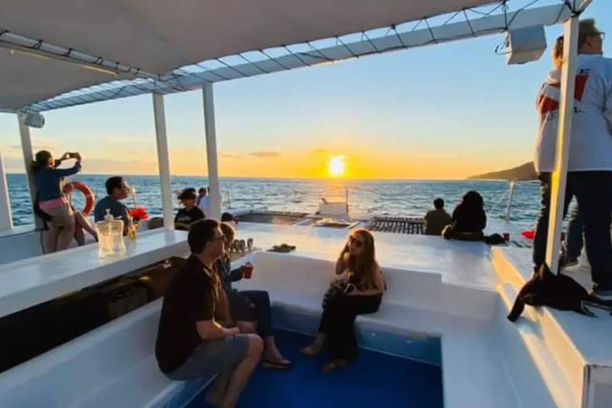 Guests watching the sunset from the deck