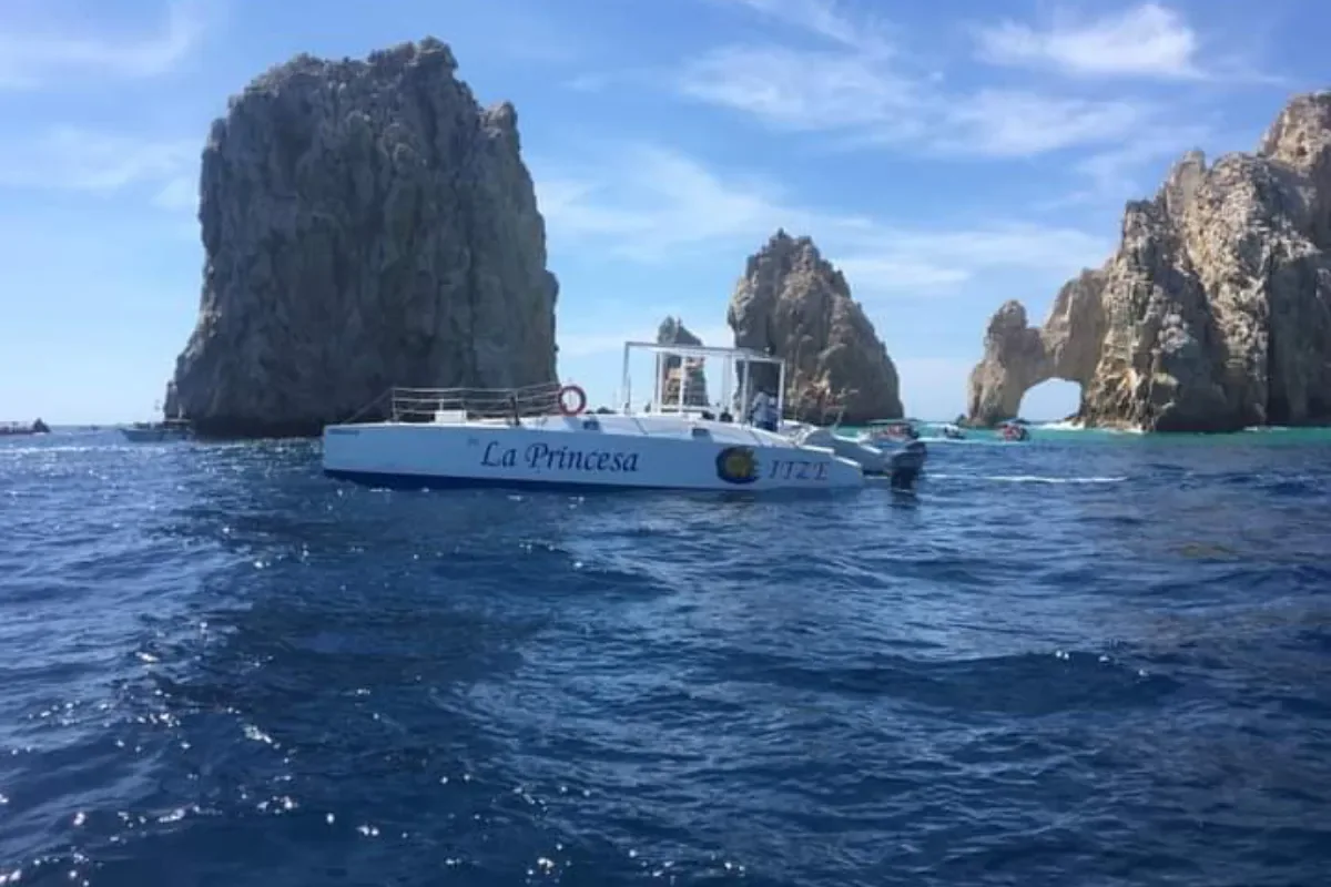 The 52' catamaran anchored near the Arch