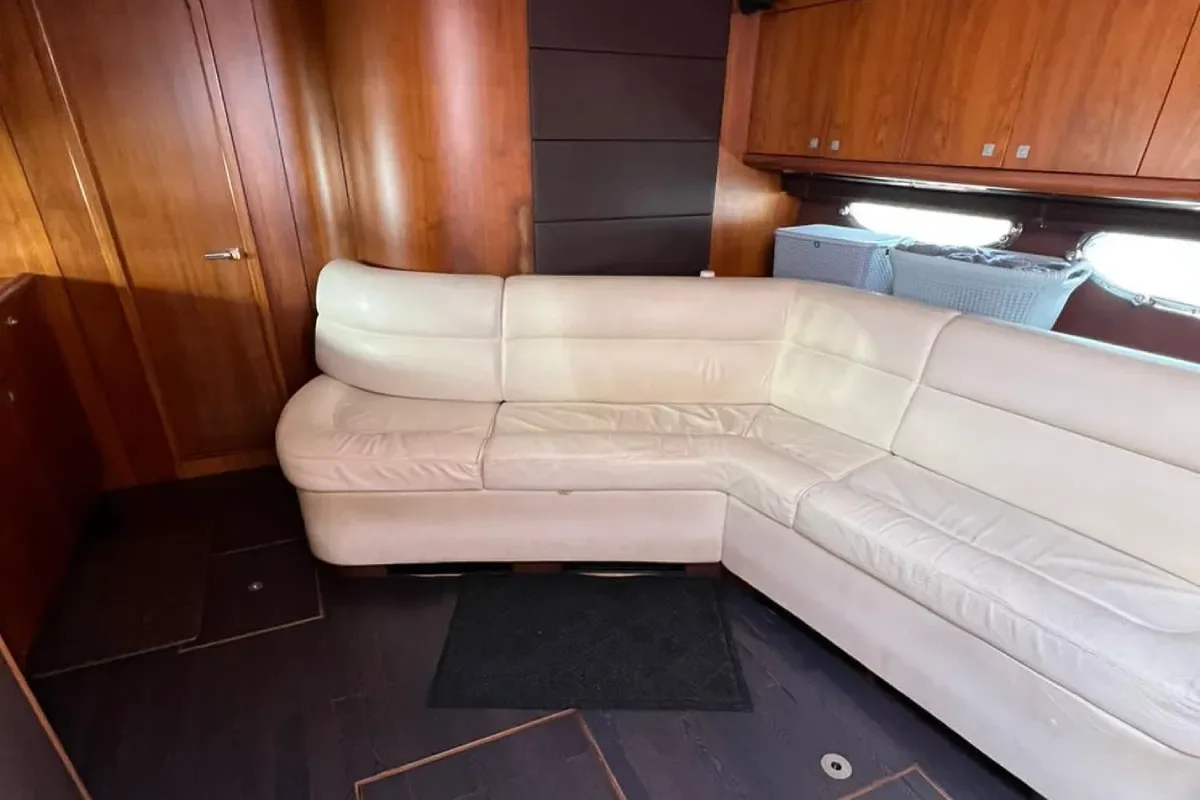 Cabin lounge with white leather seating