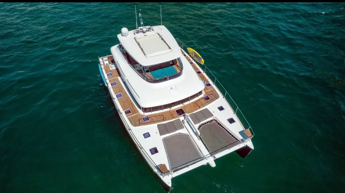 Aerial view of the 63' Lagoon on green water